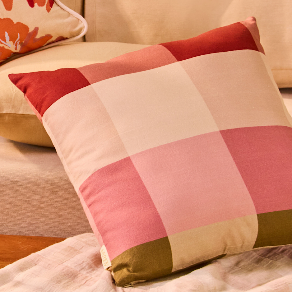 cozy corner styled with plaid cushion from aurahi